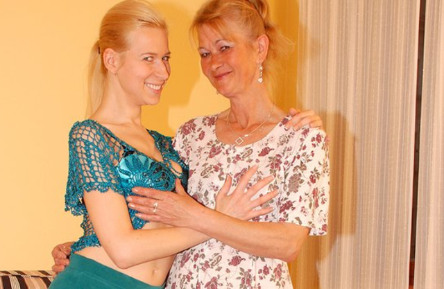 Sexy girlfriends of different age with skinny naked bodies lick each other