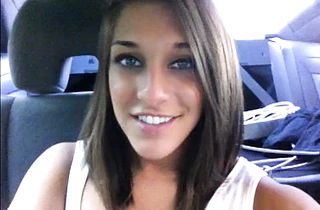 Sexy blue eyed brunette girlfriend masturbating in the back seat