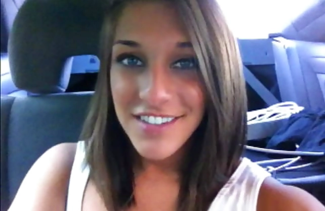 Sexy blue eyed brunette girlfriend masturbating in the back seat
