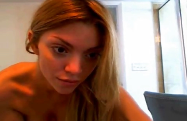 Naked girl with yummy big tits films herself in the shower