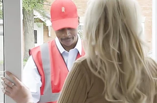 Delivery guy got his hard black rod sucked by a busty naked bombshell