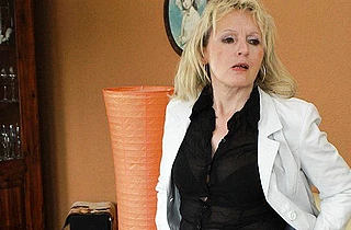 Hot naked granny like to come home after work and relax with her toy