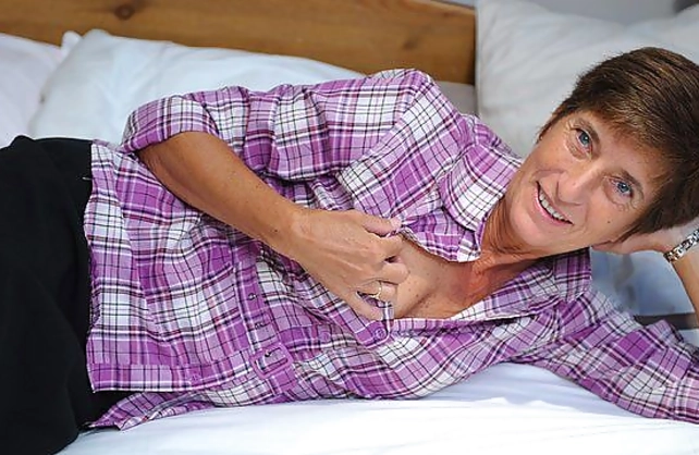 British grandma is naked and eager to have a great time with her toys