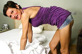 Slender naked older bombshell can not stop fucking herself with a toy