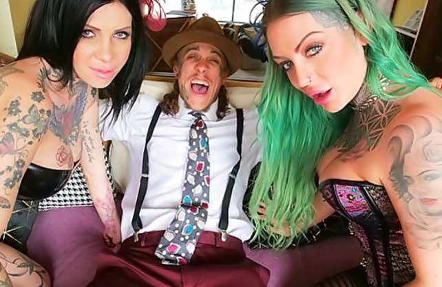 Ensnaring girls play role of tattooed nymphos who have naked threesome