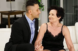 Awesome granny never stops seducing young naked dudes with hard rods