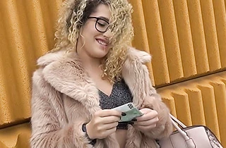 Cameraguy pays to see curly nerd's naked boobs then throws her a leg