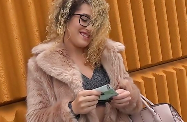 Cameraguy pays to see curly nerd's naked boobs then throws her a leg