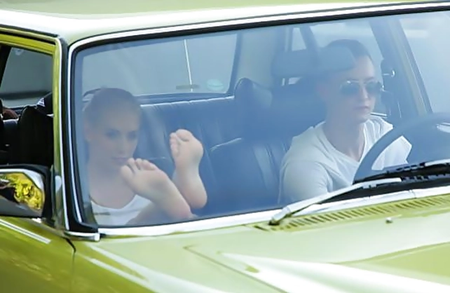 Driver licks delectable blonde's naked feet then fucks wet pussy