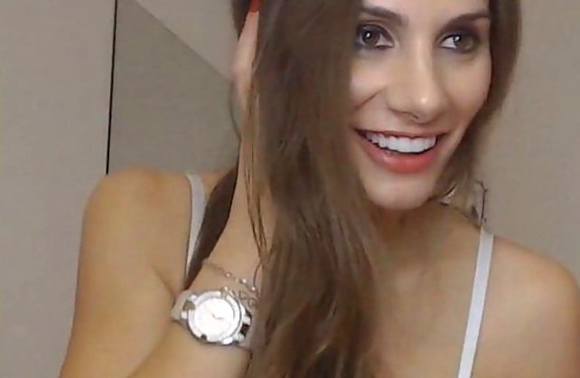Hot teen in white lingerie is almost naked fucking herself for fans