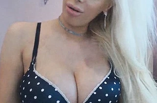 Stunning blonde with massive naked tits masturbates using big vibrator