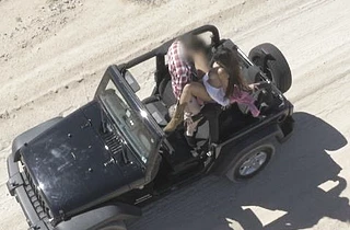 Drone records fellow's sex with beautiful naked girl in jeep among sands