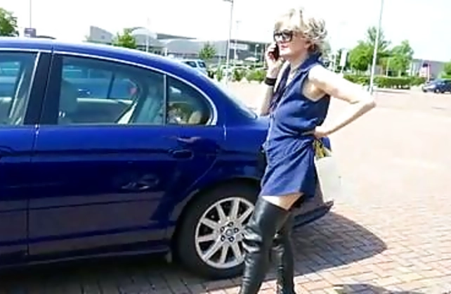 Blonde granny gives driver hot BJ while he thinks about naked girls