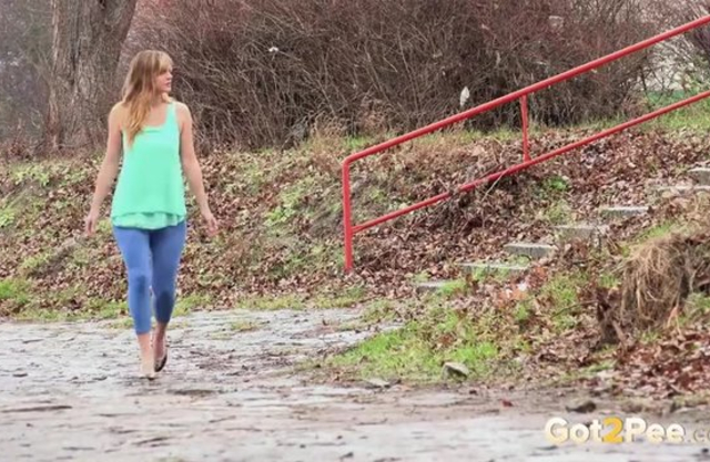 Lovely naked girl finds quiet spot and takes piss in beautiful video