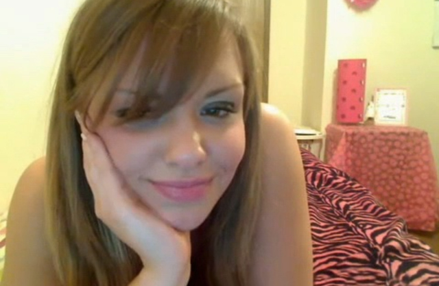 Cute girl gets naked in front of her webcam |