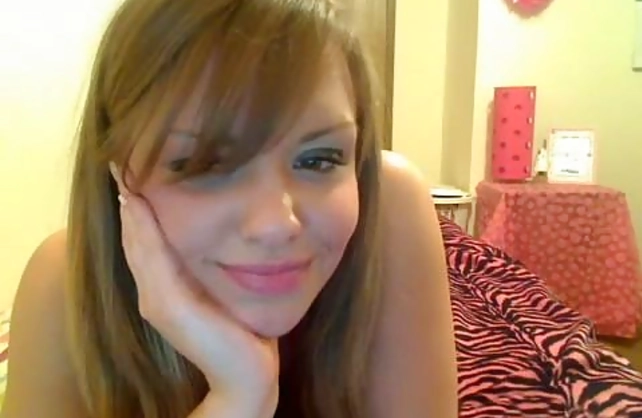 Cute girl gets naked in front of her webcam