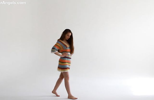 Curvy naked girl with amazing small boobs demonstrates her nudity in a nice way in the erotic play