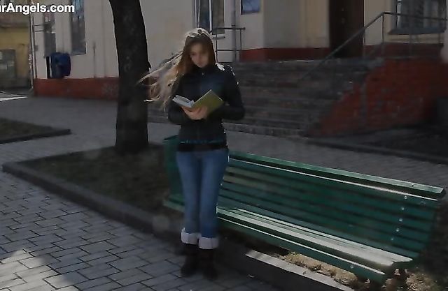 Naked girl with long hair plays a breathtaking solo in front of the camera showing off pink twat
