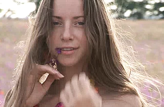 Sweet naked girl with tiny tits demonstrates her lean body and narrow pussy outdoors