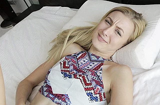 Smiling naked girl with a pretty face deepthroats a cock in a closeup scene