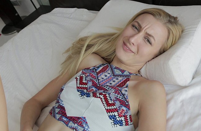 Smiling naked girl with a pretty face deepthroats a cock in a closeup scene