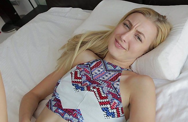 Smiling naked girl with a pretty face deepthroats a cock in a closeup scene