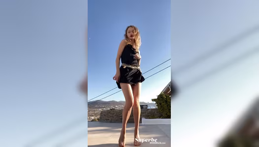 Natural brunette flaunts her naked curves under flowing dress