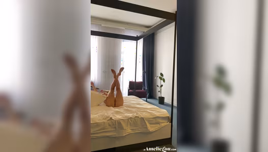 Flexible brunette gets naked on bed showing perfect body