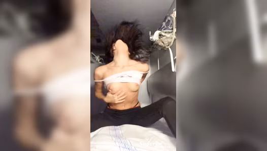 Beautiful woman exposes her naked breasts on camera