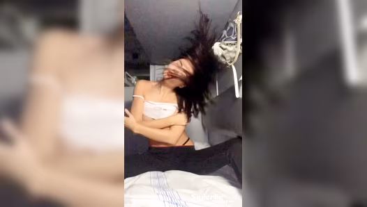 Beautiful woman exposes her naked breasts on camera