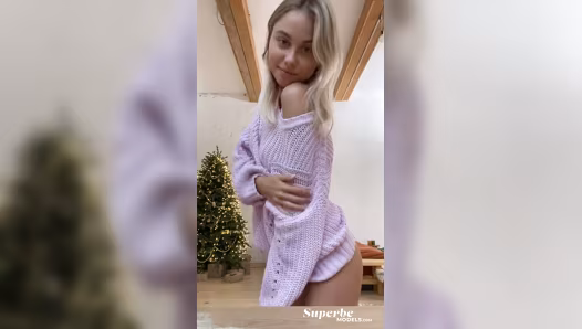 Young woman flaunts her body before going naked on camera
