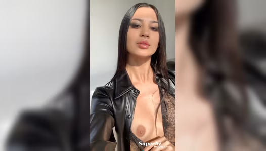 Woman exposes perky breasts and gets naked while filming at home