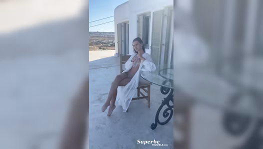 Tempting beauty gets naked inside her home and exposes her hot body