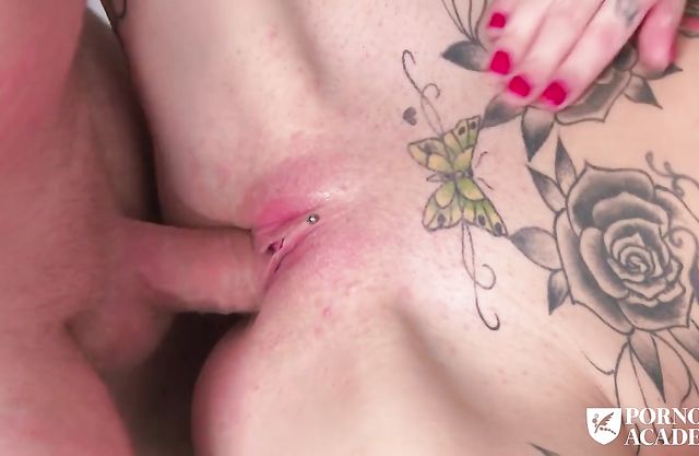 Filthy tattooed slut girl with fake juggs gets screwed rough by two studs