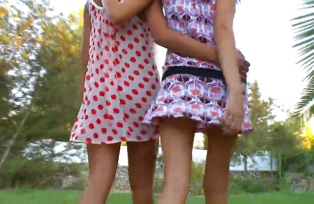 Two girls meet in the back yard, get naked and fuck like crazy