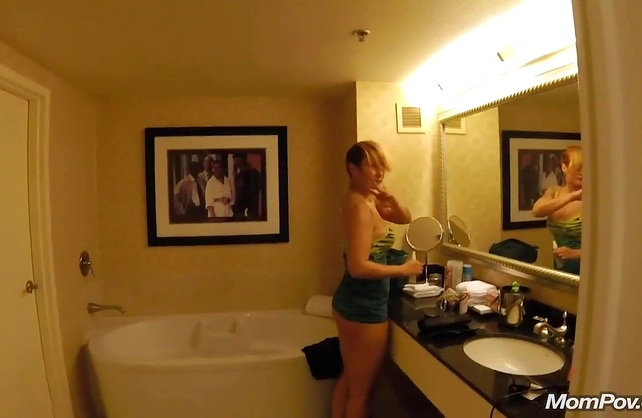MILF is surprised in the shower by her stepson who tries to seduce her