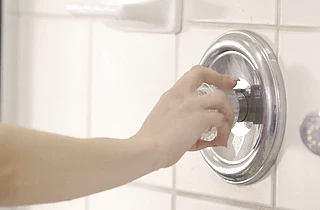Slutty cougar with huge tits fucks a stud with a big cock in the shower