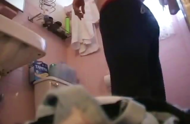 Naked young babe gets taped in secret while in the shower