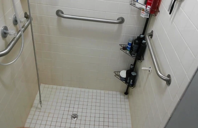 Naughty slut in glasses sits on her guy's face in the shower gets licked