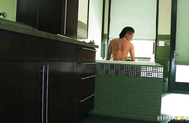 Sweet tattooed teen shows off glorious curves in the shower and soaps her ass