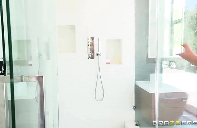 Glamorous girlfriend soaps and creams her body in the shower and shows off