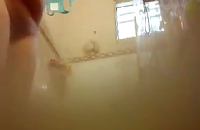 Naked beauty taped in secret down the shower when getting clothed