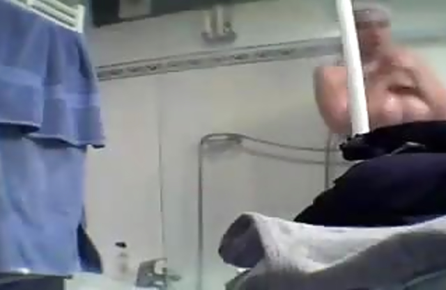 Hot milf with big saggy boobs and hairy pussy relaxes after taking a shower