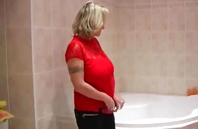 Hot busty vixen with huge bouncing boobs gets naked to have a shower