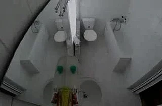 Sexy girl gets completely naked and takes a shower on a hidden camera