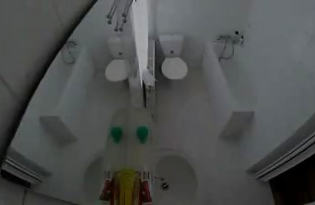 Sexy girl gets completely naked and takes a shower on a hidden camera