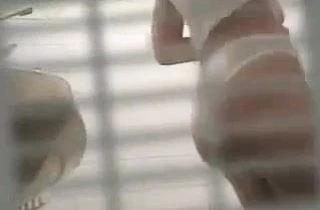 Voyeur feeds his lust with insane nude view of some sexy teens