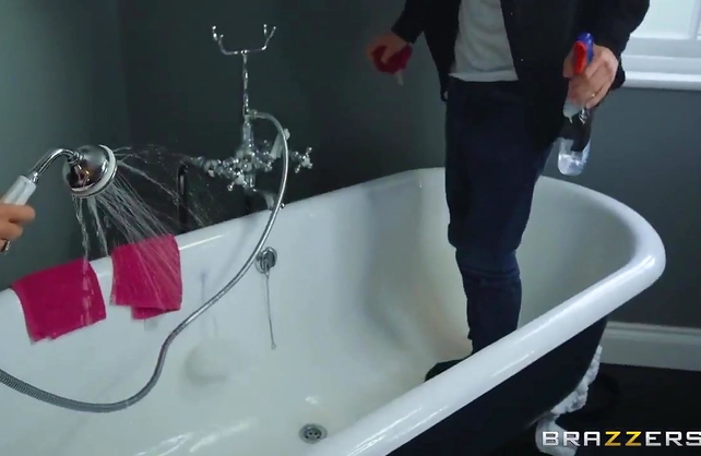 Stepmom gives a blowjob to her stepson and lets him fuck her in the shower