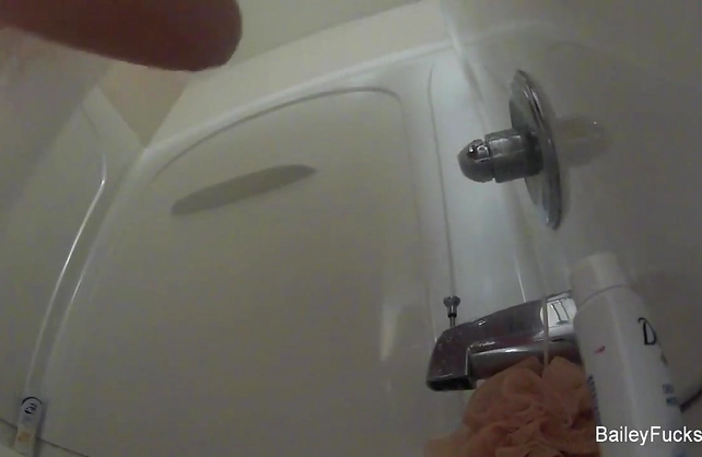 Sugary girl with appetising body and hot boobs takes a shower and rubs cunt
