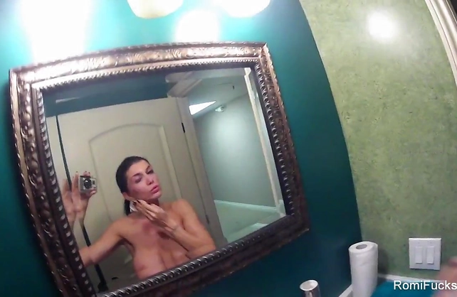 Naked bitch films herself touching and masturbating in the shower